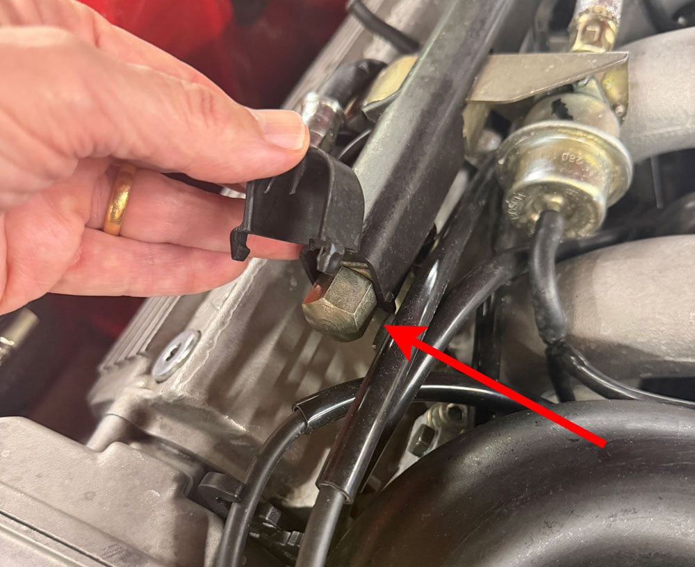 Fuel rail end cap used to relieve fuel pressure on a Porsche 944